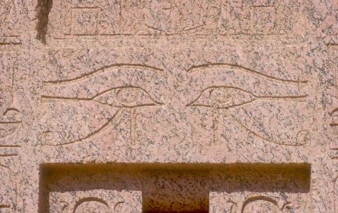 Madinat Habu, Roman forecourt of Amen temple, granite false door from Memorial temple of Thutmes III, detail: pair of Horus eyes