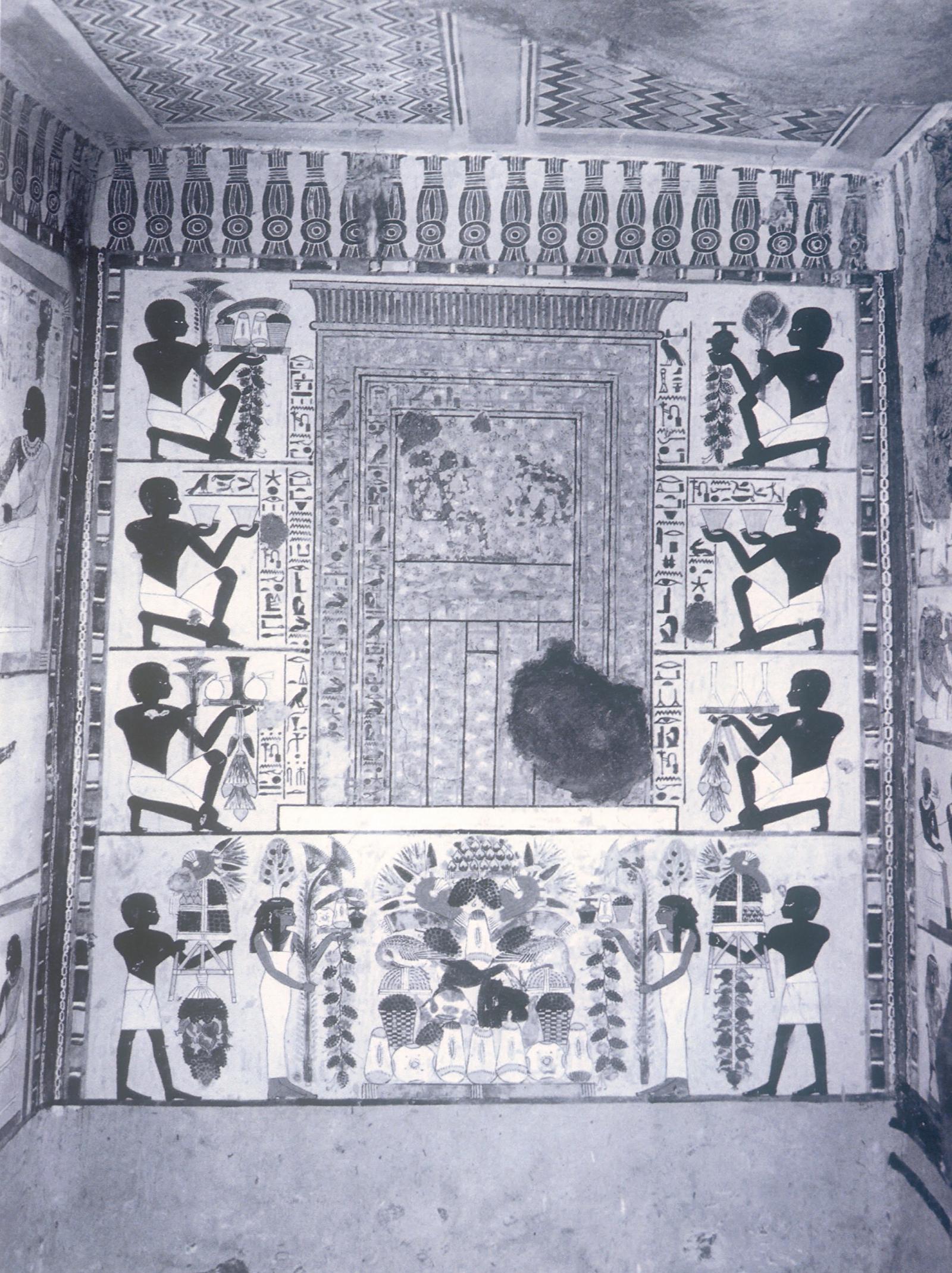 The south wall of the Dynasty 18 tomb of the scribe Nakht. Three rows of offering bearers on the sides and two additional bearers accompanied by tree goddesses below hold food and supplies. These are directed toward a false door.