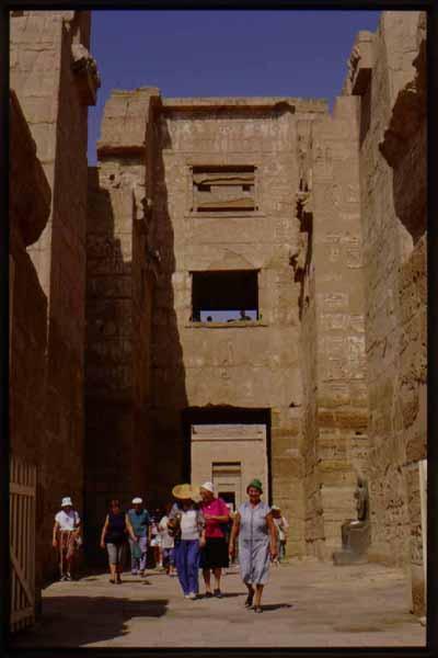 Madinat Habu, Rameses III Memorial temple, East High Gate, east face, looking west (with tourists).