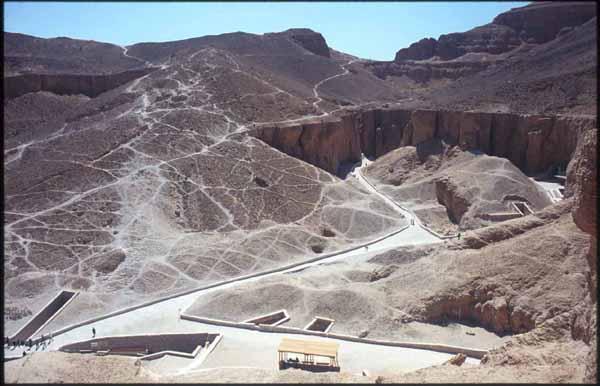Valley of the Kings, cliff above KV 09, looking south. Also visible are the entrances to KV 11, KV 57, KV 49, KV 48, KV 61, KV 29, KV 47 and a tourist shelter.